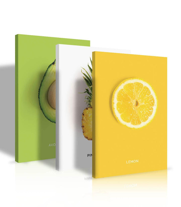 Tríptico de frutas Massinart en decoración de comedor escandinavo moderno