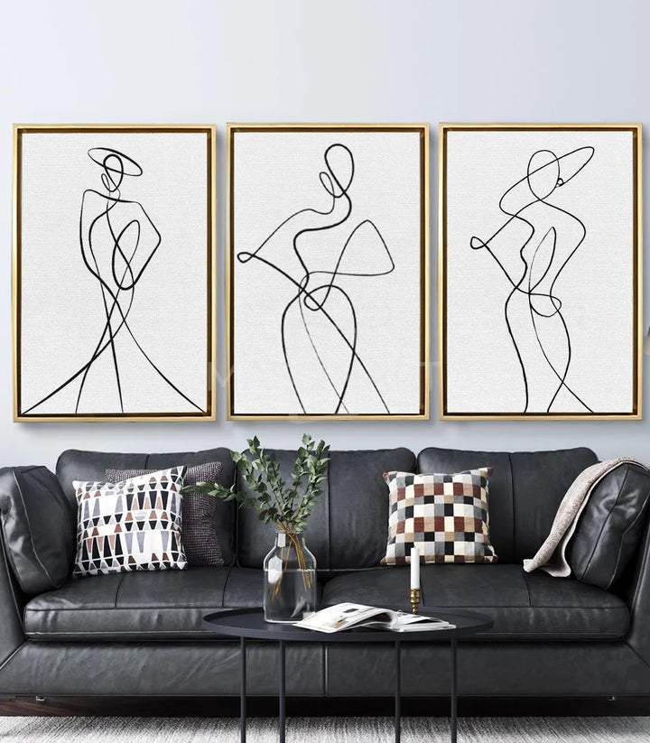 Tríptico silueta femenina en salón moderno decoración contemporánea Massinart
