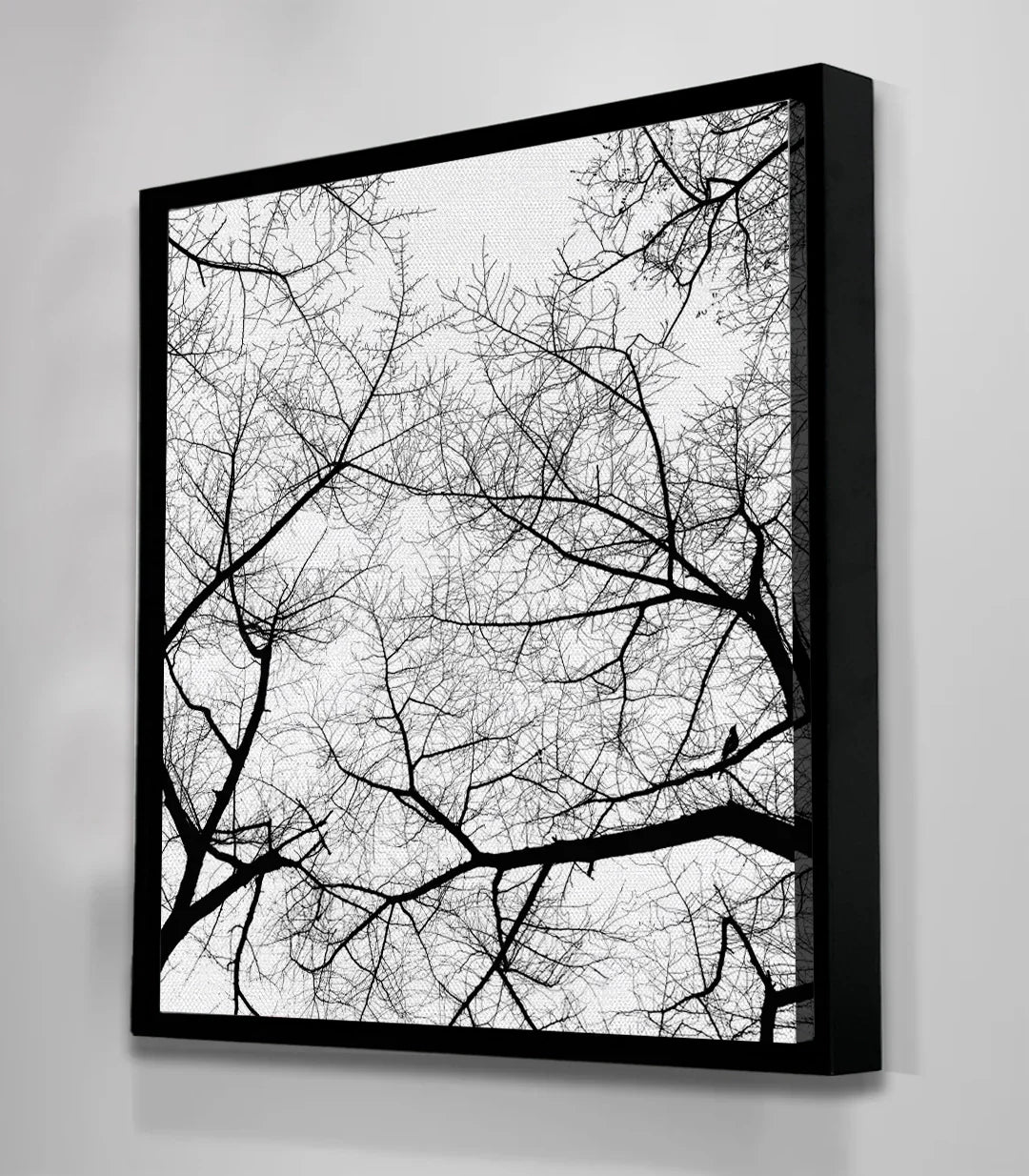 Cuadro Branches Fade Massinart en salón moderno — marco negro elegante