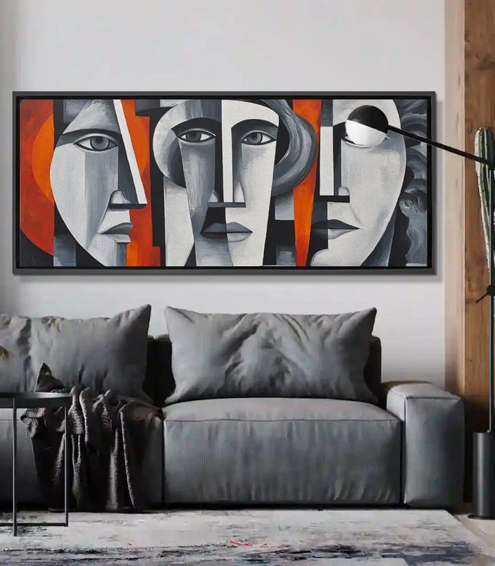 Cuadro Unspoken — tres rostros cubistas abstractos en gris, blanco y naranja sobre fondo negro, Massinart