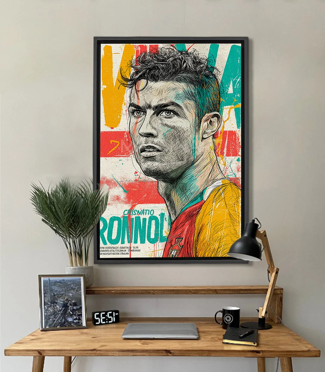 Cuadro retrato Cristiano Ronaldo pop-art — rostro detallado con tinta negra sobre fondo multicolor azul turquesa rojo amarillo | Massinart