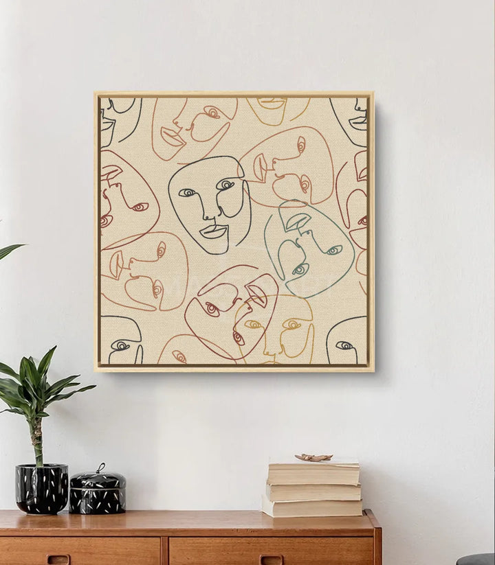 Cuadro Faces Massinart — ambientación en salón con accesorios decorativos