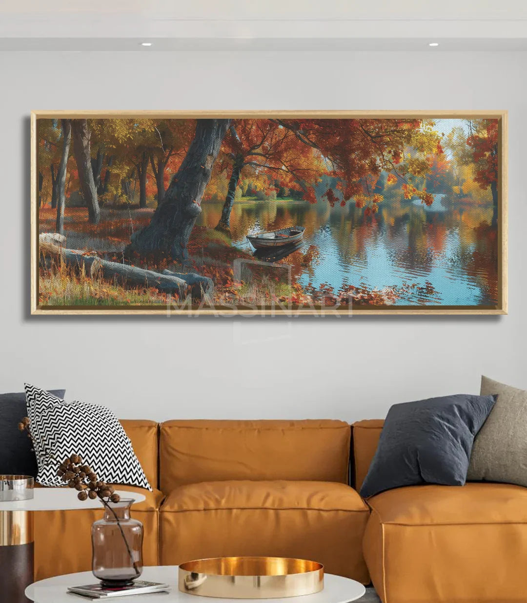 Decoración interior contemporánea con cuadro de naturaleza bosque otoño Massinart y mobiliario cálido