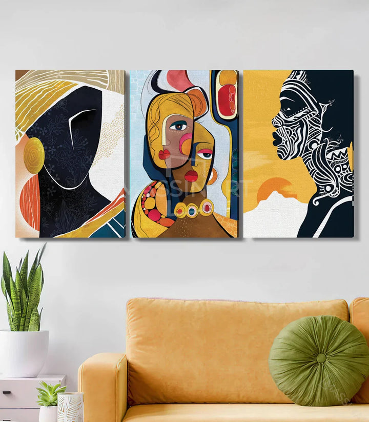 Ambientación salón moderno — tríptico African Soul sobre sofá dorado, decoración contemporánea Massinart