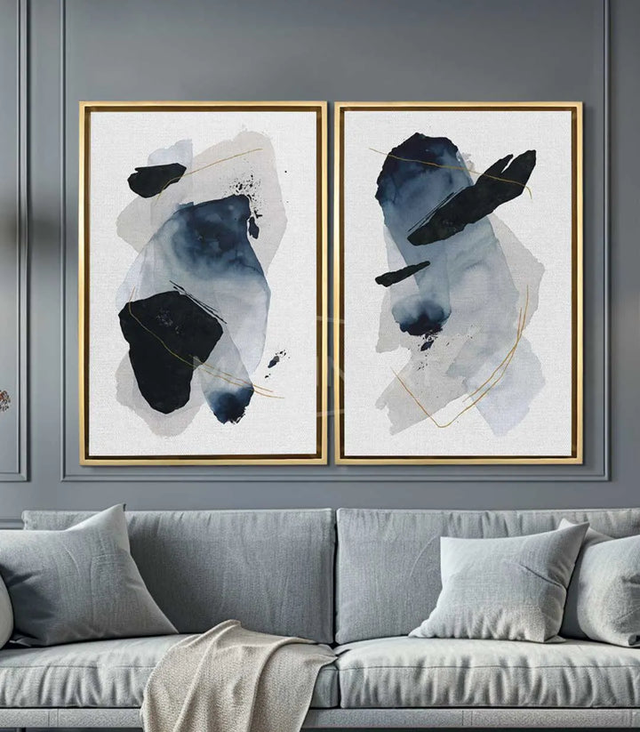 Ambientación en salón moderno con díptico de plumas abstractas Massinart