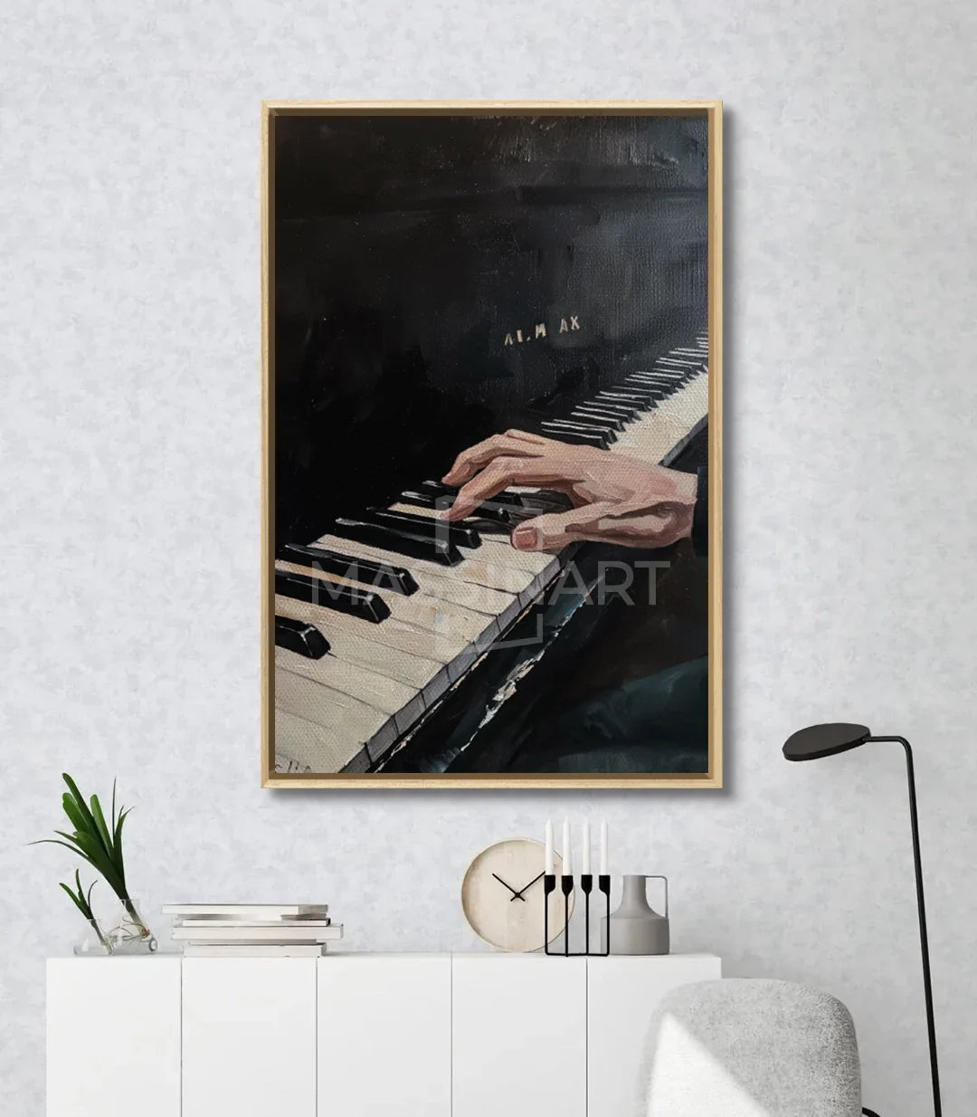 Detalle decoración interior con cuadro Melodic Touch piano manos Massinart