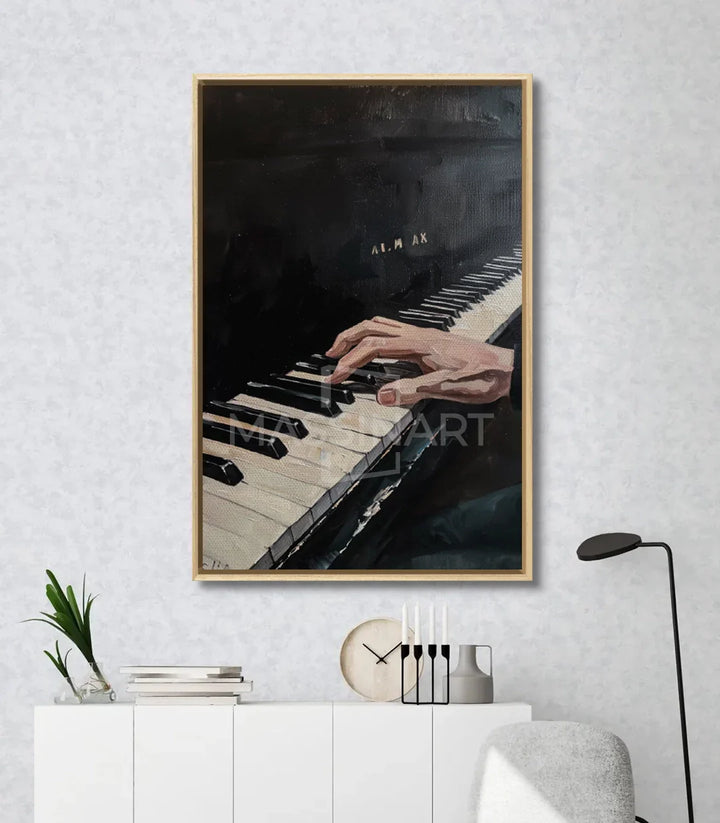 Detalle decoración interior con cuadro Melodic Touch piano manos Massinart