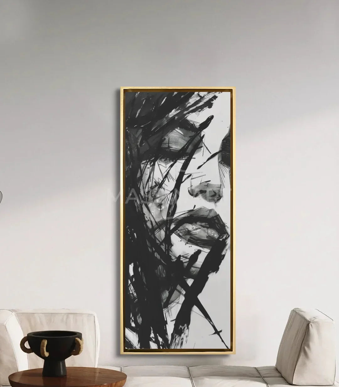 Cuadro Unbroken en salón moderno — retrato blanco y negro enmarcado sobre sofá, Massinart