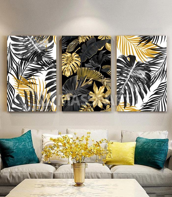 Tríptico Golden and Black Leaves — hojas tropicales en negro, blanco y dorado sobre fondo claro, cuadro decorativo Massinart