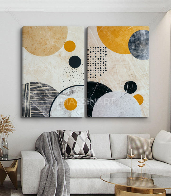 Ambientación cuadro Sphere díptico sobre sofá gris, salón moderno de estilo minimalista Massinart