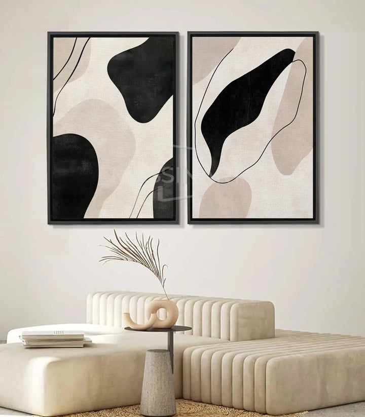 Cuadro Flowing Silence díptico — formas abstractas negras y beige sobre fondo blanco roto, Massinart