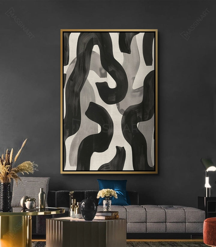 Cuadro Edge en salón moderno — lienzo abstracto negro y blanco sobre sofá gris
